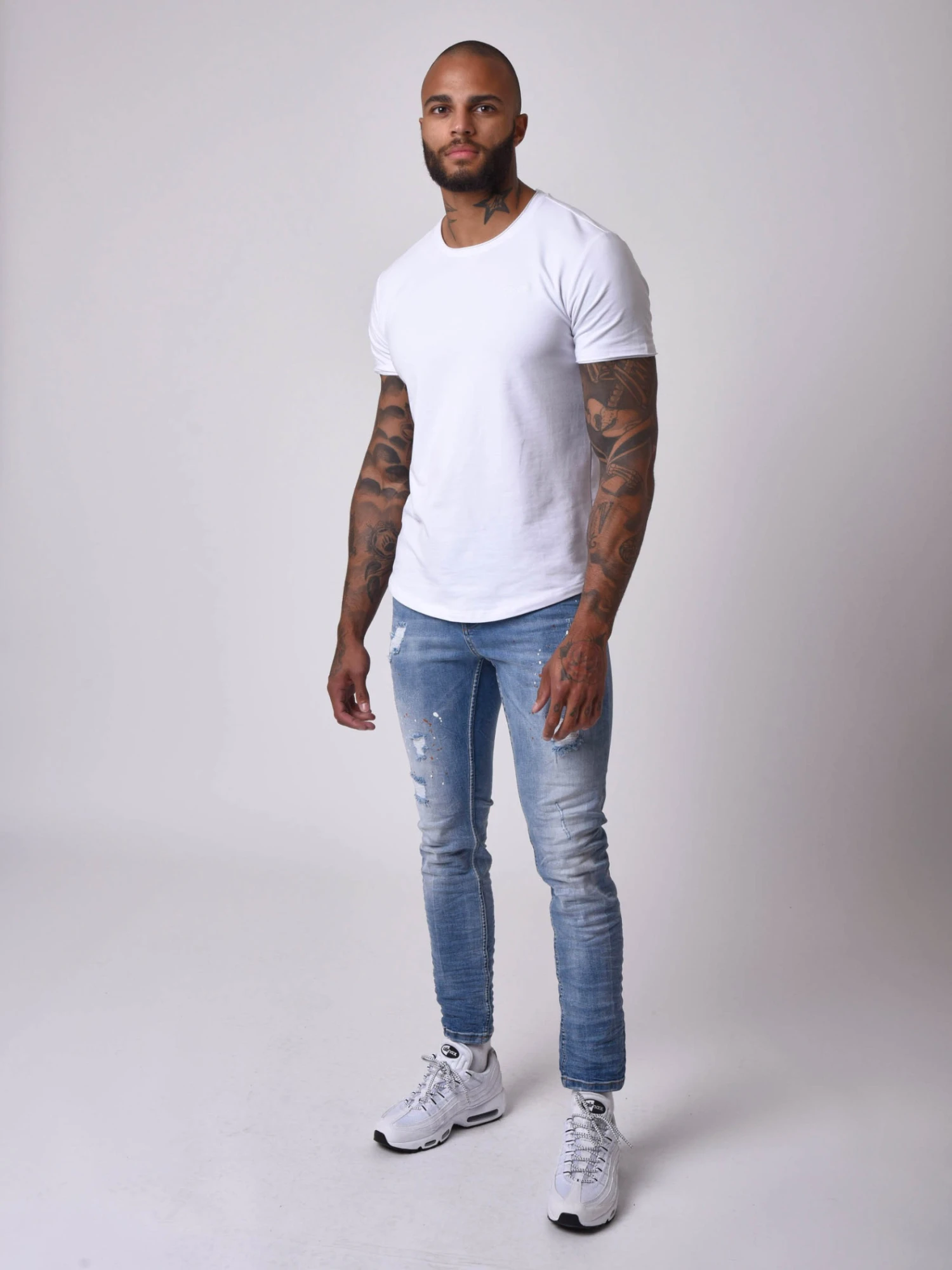 Jean Skinny Fit Délavage Bleu Clair Tacheté Effet Usé