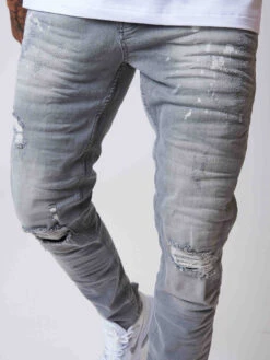 Jean Slim Effet Usé Avec Taches Délavées